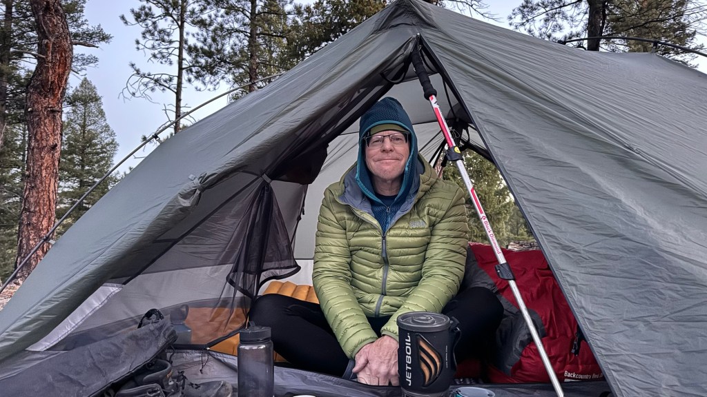 person sitting in tent
